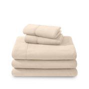 Polar fleece sheets and pillowcases folded and stacked on a white background