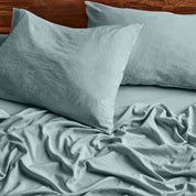 Close up of sheets and pillowcases on a bed