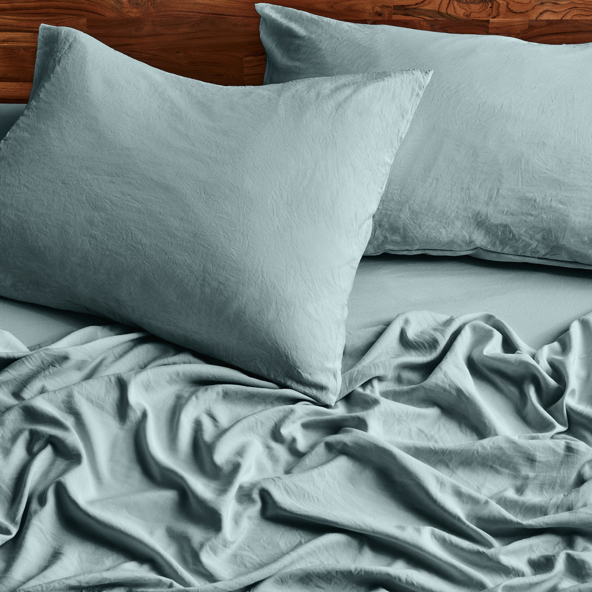 Close-up of sheets and pillowcases on a bed