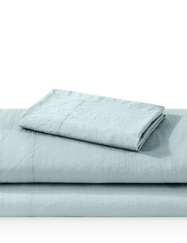 Washed sheet set folded and stacked