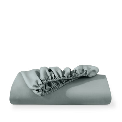 Microfiber fitted sheet folded with a white background