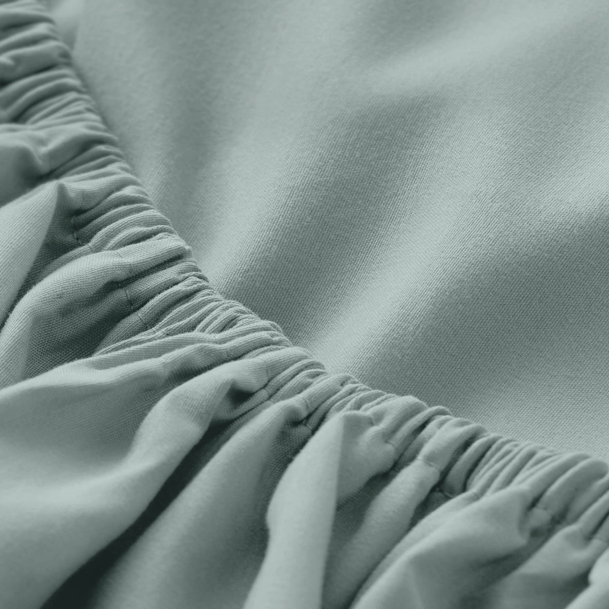 Close-up of fitted sheet with all around elastic
