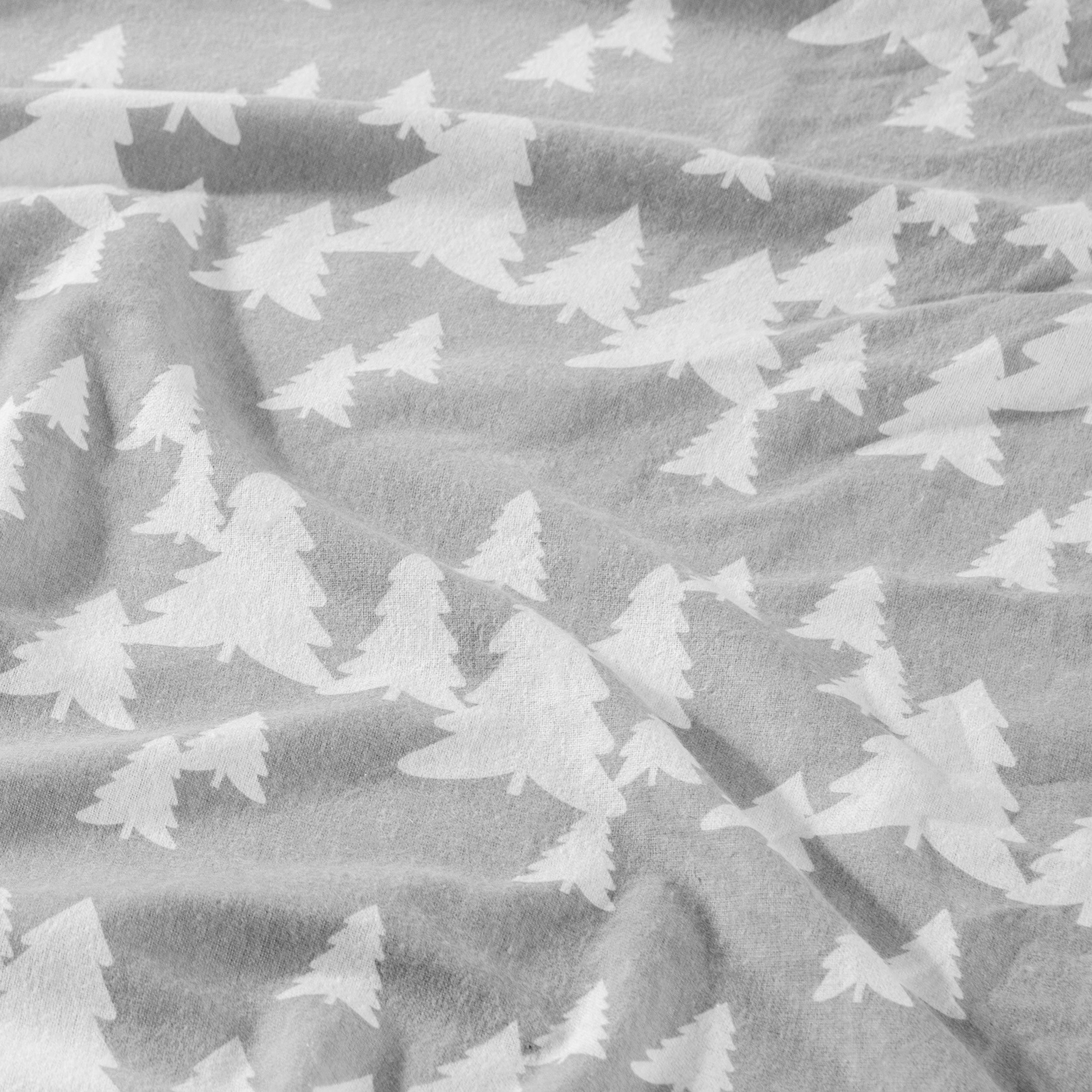 Close up of flannel winter trees fabric