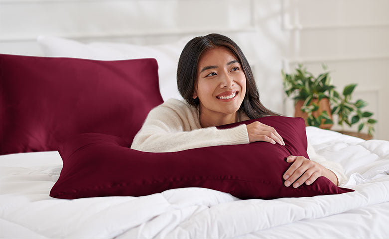 Lady laying on a mulberry silk pillowcase