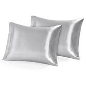 Two mulberry silk pillowcases on pillows