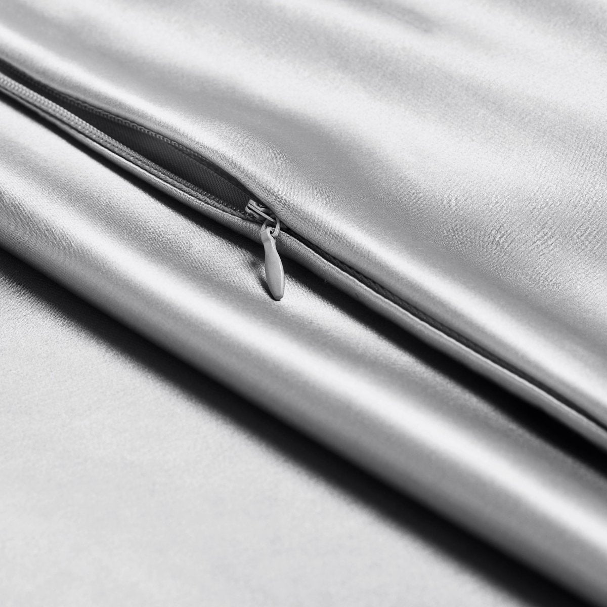 Close-up of a silk pillowcase with a zipper