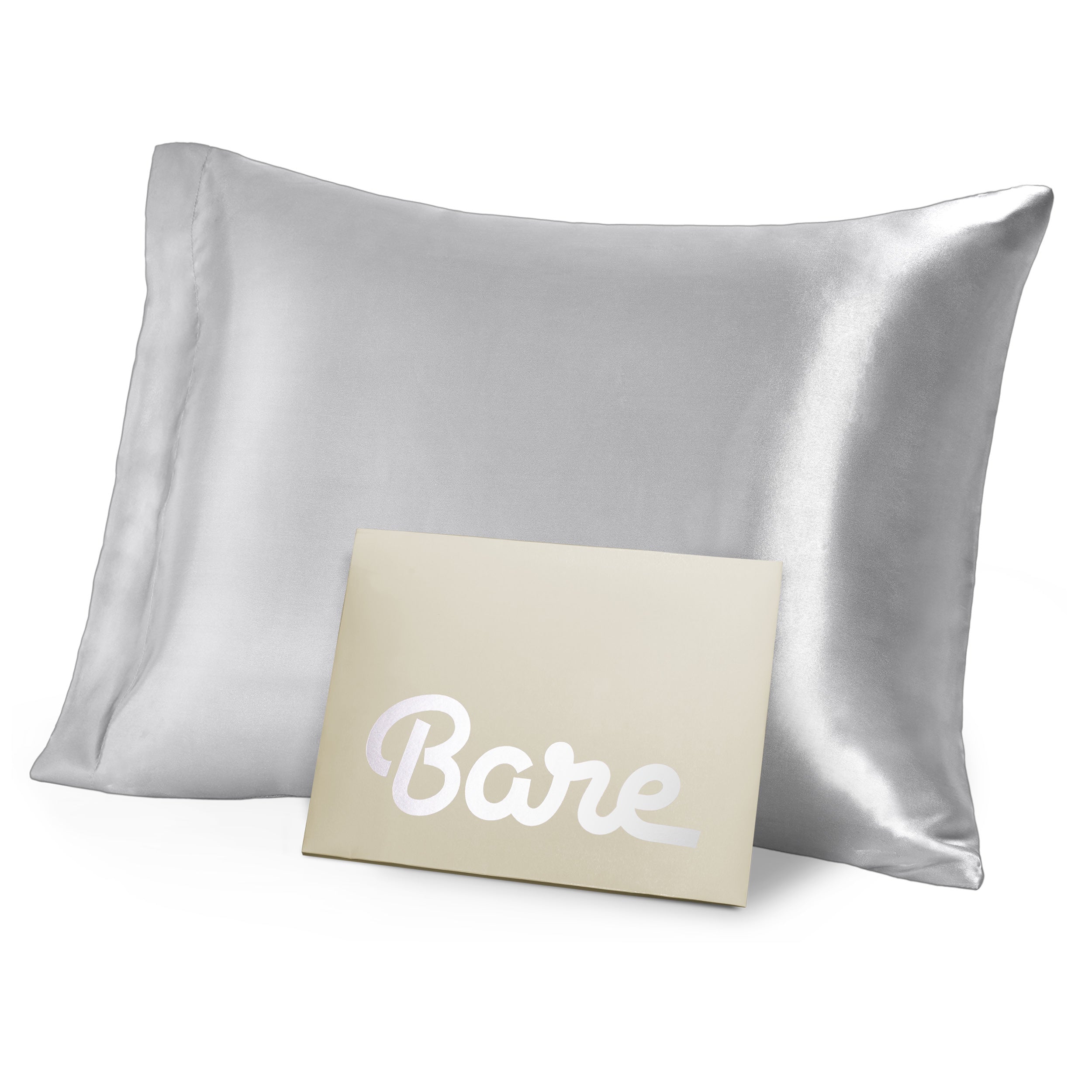 A silver mulberry silk pillowcase on a pillow