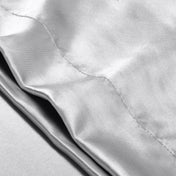 Close-up of the envelope closure on the satin pillowcase
