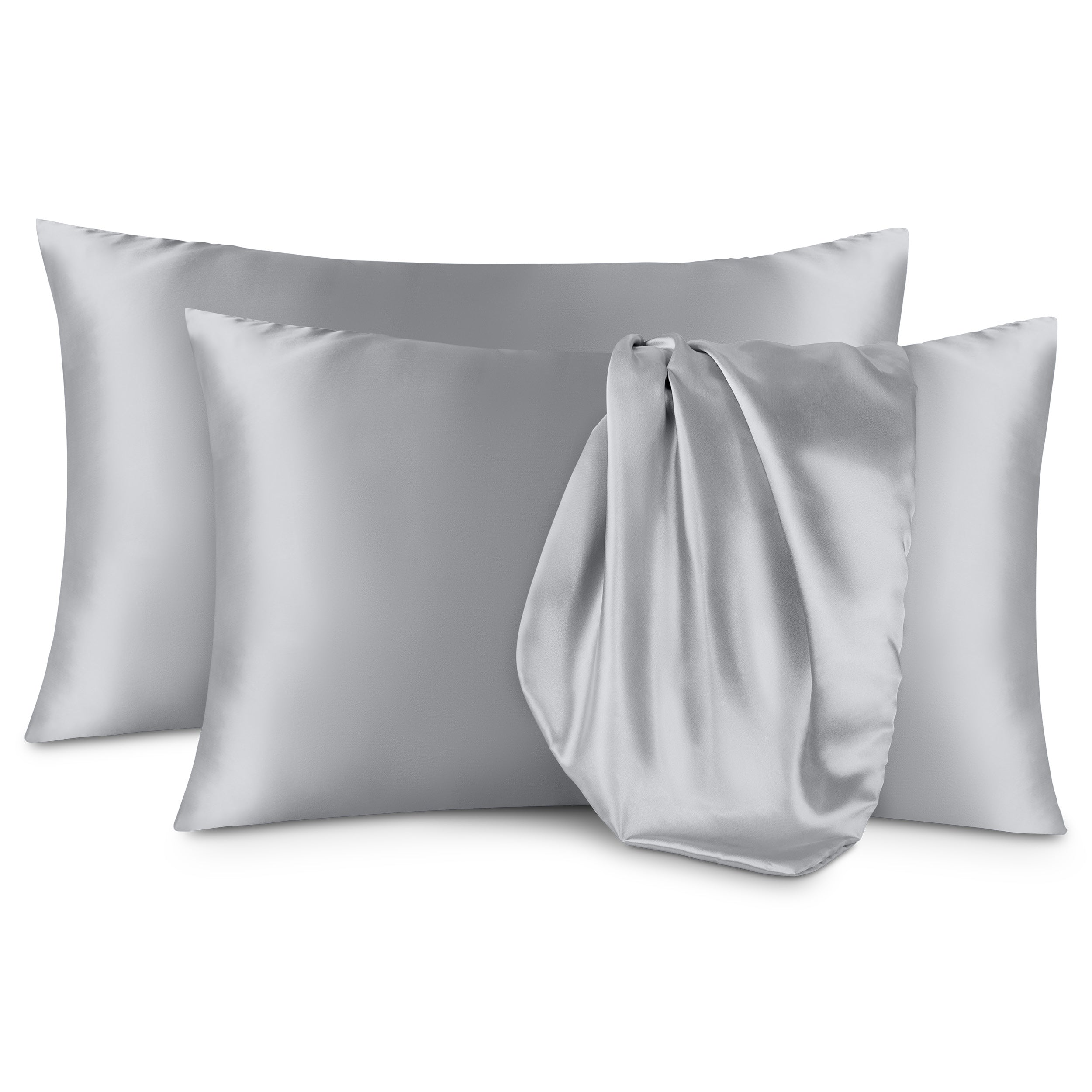 Two satin pillowcases on a white background