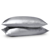 2 satin pillowcases on pillows stacked