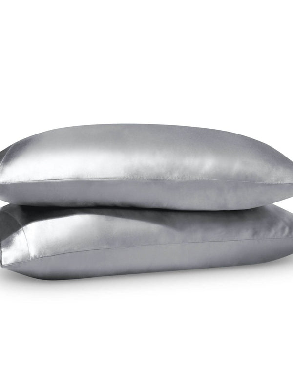 2 satin pillowcases on pillows stacked