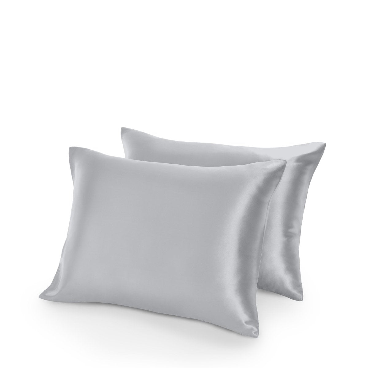 Two satin pillowcases on a white background