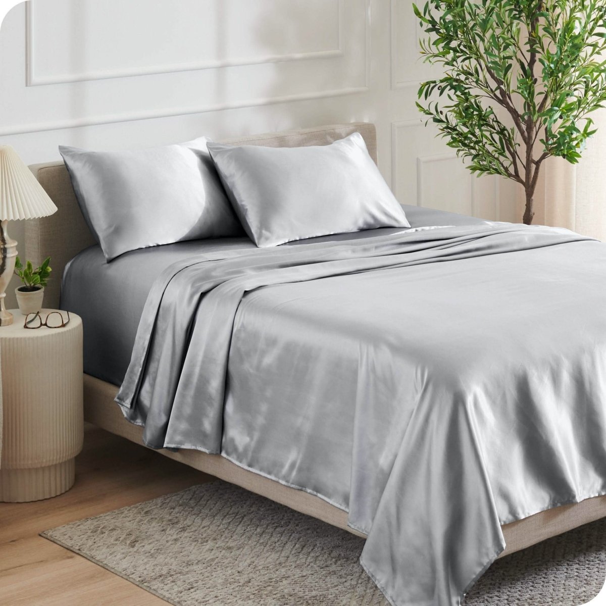 Satin sheets on a bed