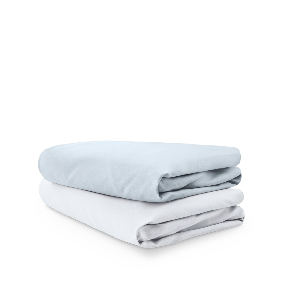Stack of folded crib sheets on a white background