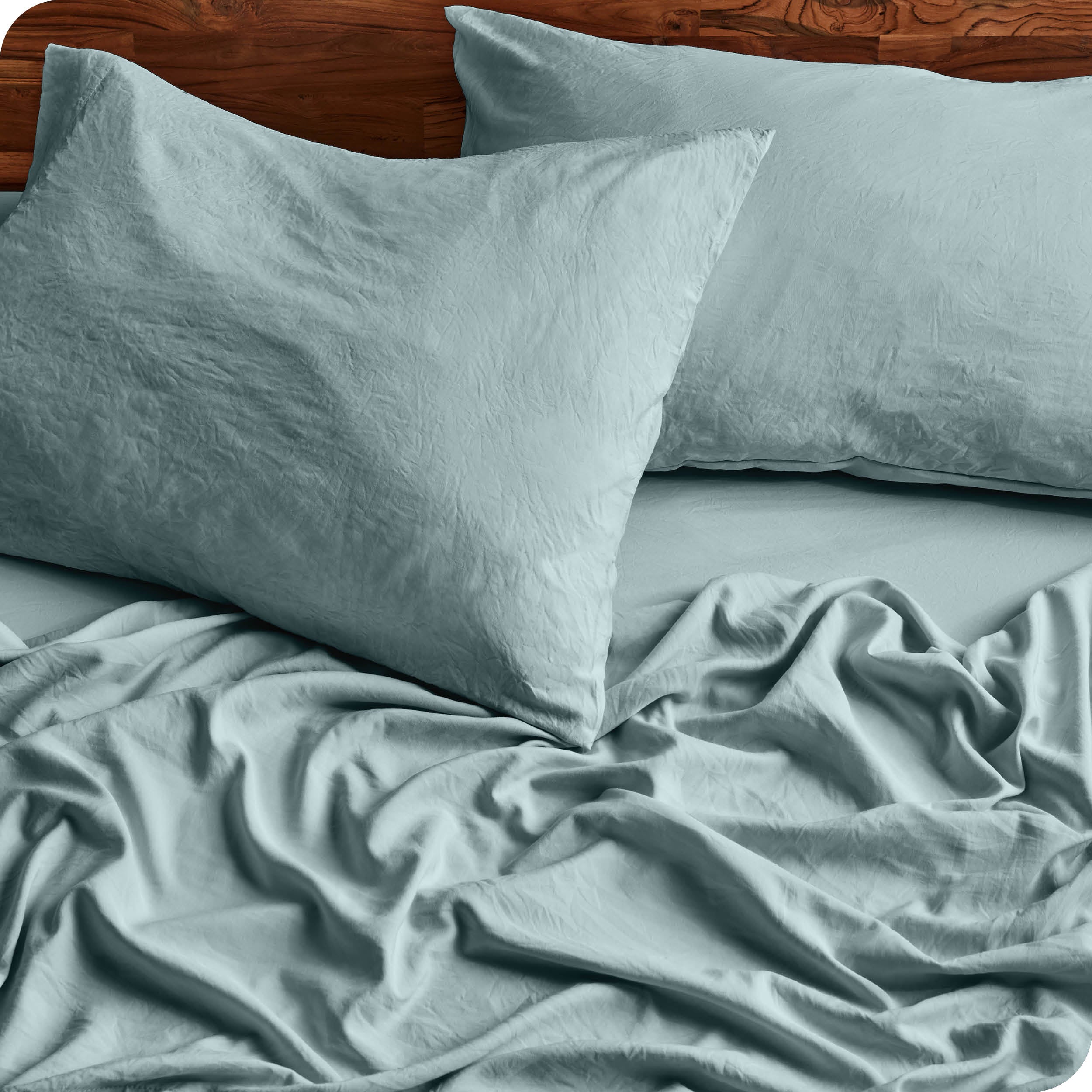 Close in view showing texture of sandwashed sheet set on the bed