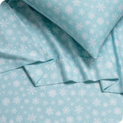 Close up of sheets and pillowcase on a bed