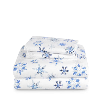Stack of flannel sheets and pillowcases on a white background