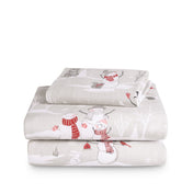 Stack of flannel sheets and pillowcases on a white background