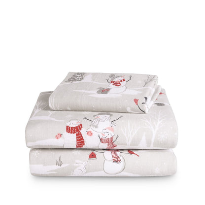 Stack of flannel sheets and pillowcases on a white background