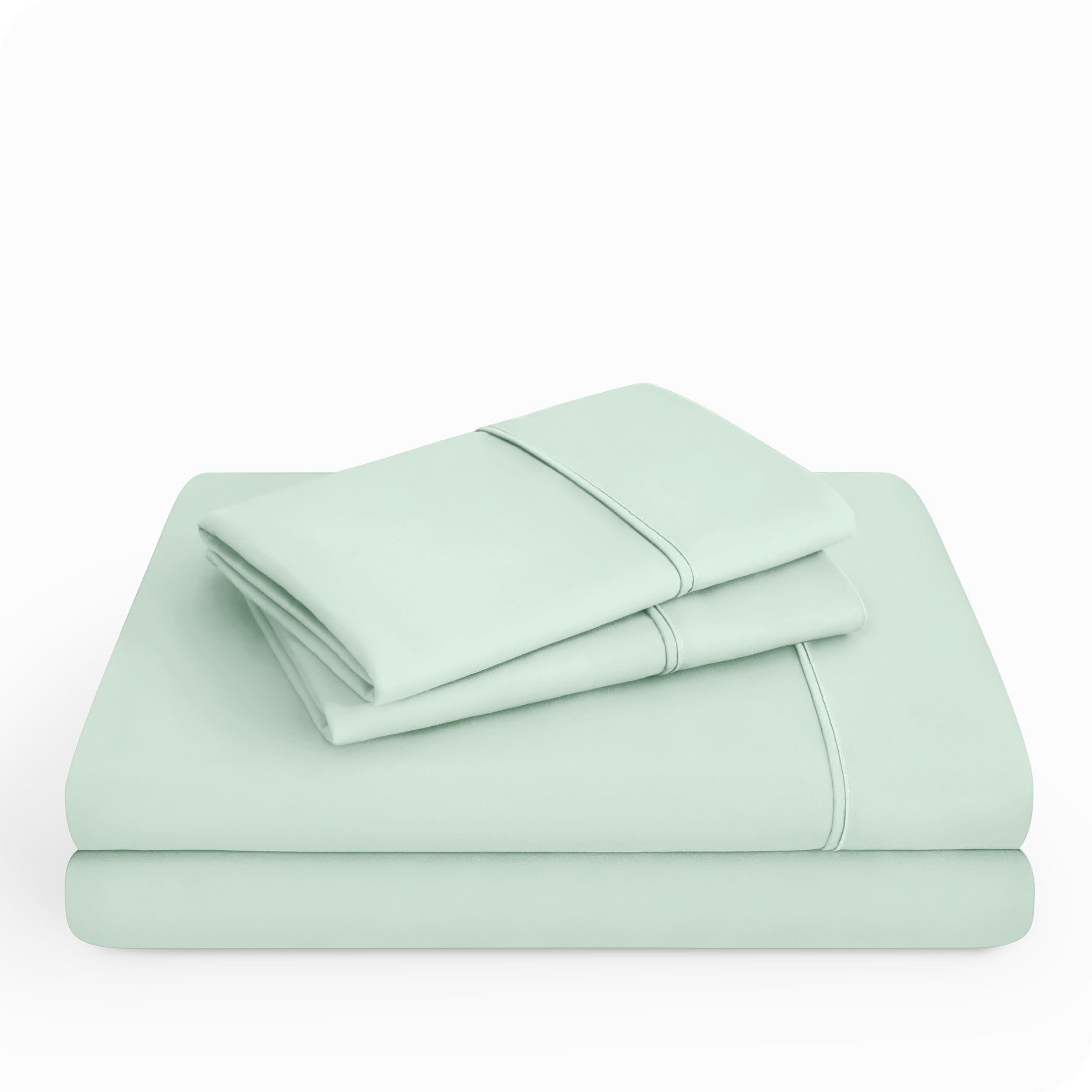 Microfiber sheet set folded and stacked neatly.