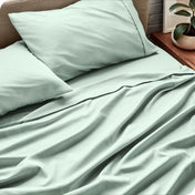 Close up of a microfiber sheet set on a bed