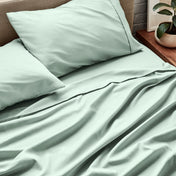 Close up of ultra-soft sheets on a bed