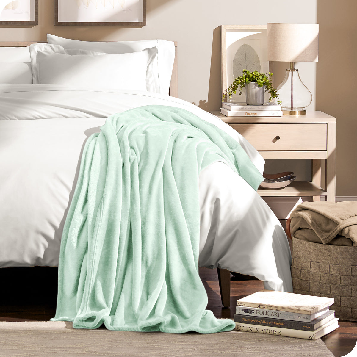 Microplush blanket draped over the corner of a bed