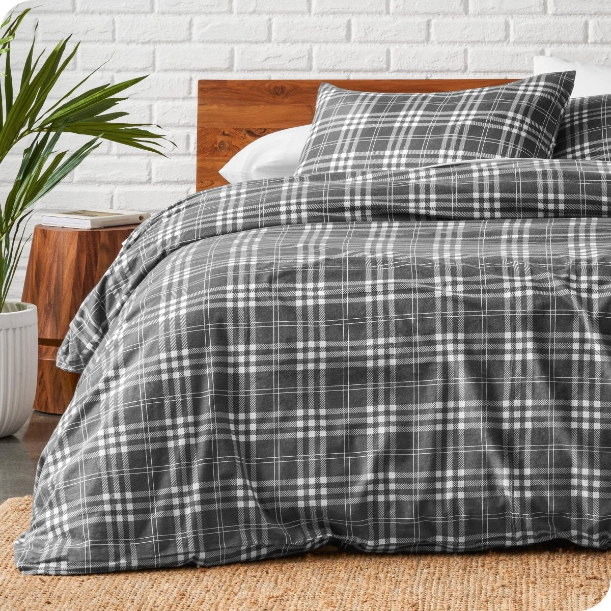 Stirling plaid duvet on a bed