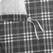 Close-up of the ties on a flannel duvet cover