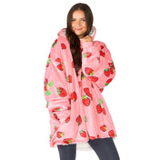 An adult with a sherpa wearable blanket on