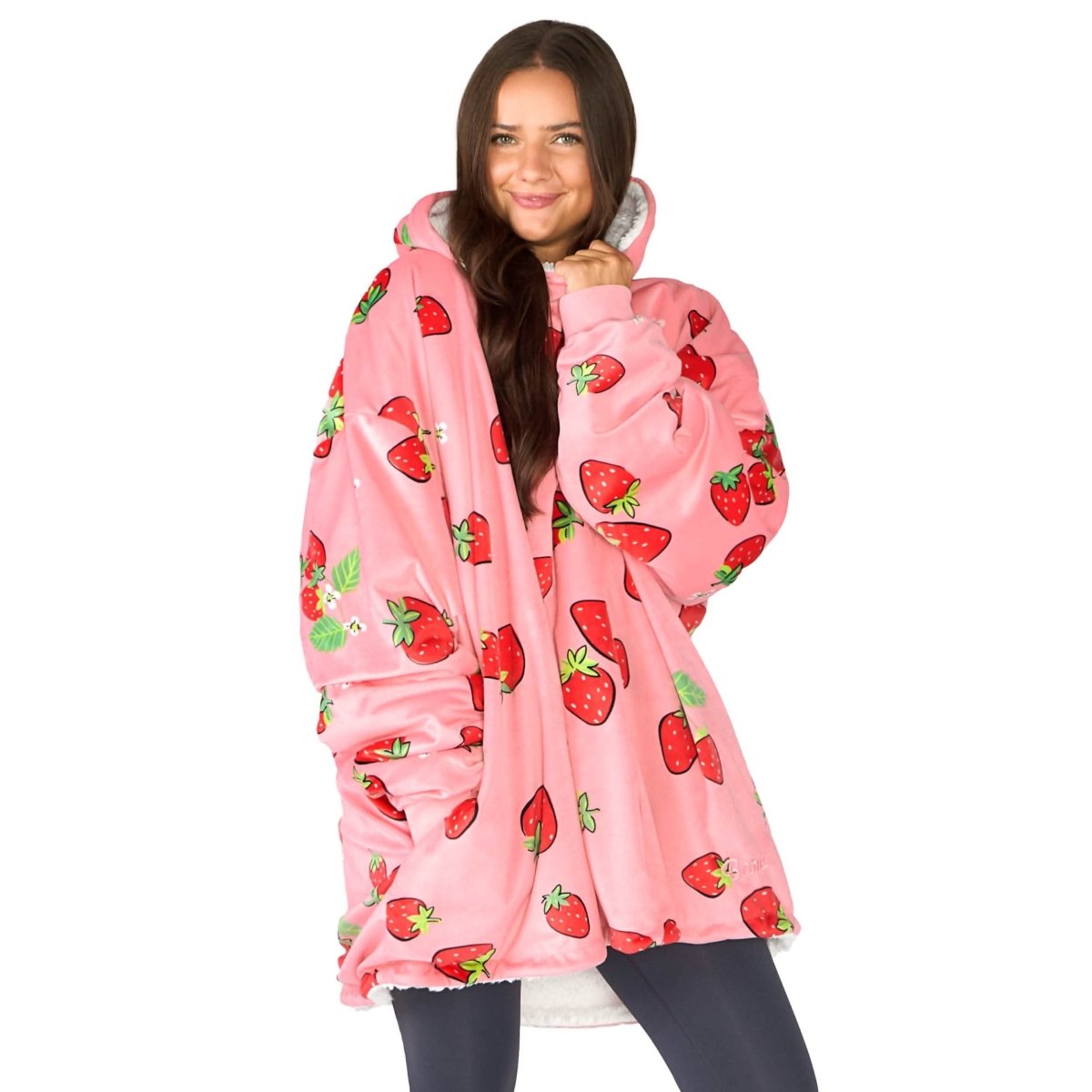 An adult with a sherpa wearable blanket on