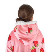 A child with a sherpa wearable blanket on