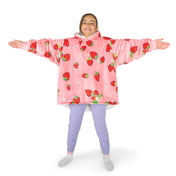 A child wearing a hooded blanket