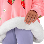 Child wearing a Bare Home wearable blanket