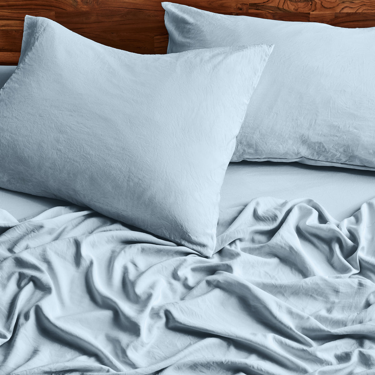 Close-up of sheets and pillowcases on a bed