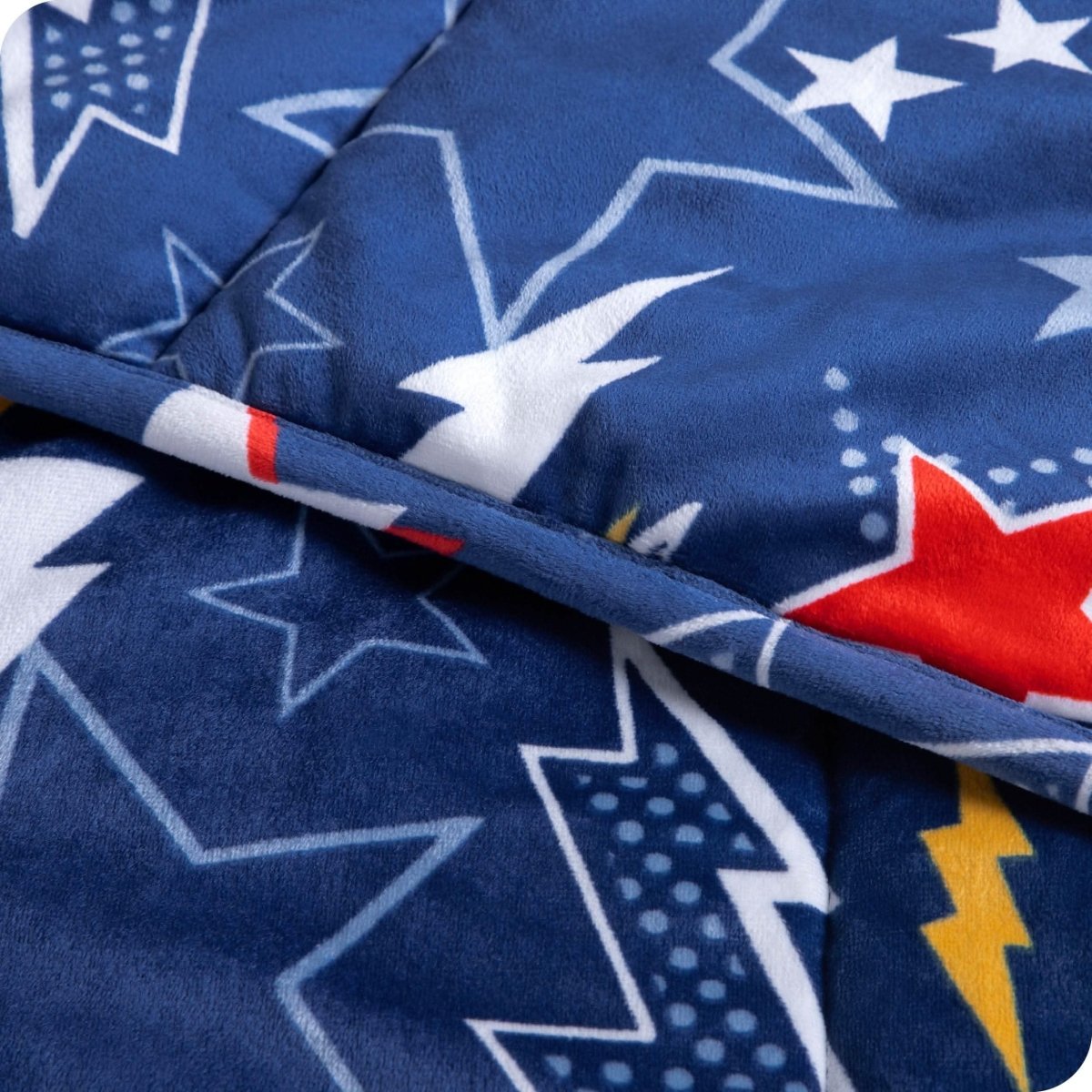 Close-up image of a weighted blanket, featuring detailed stitching and the neatly finished edge of the blanket.