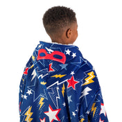 A child with a sherpa wearable blanket on
