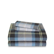 Stack of flannel sheets and pillowcases on a white background