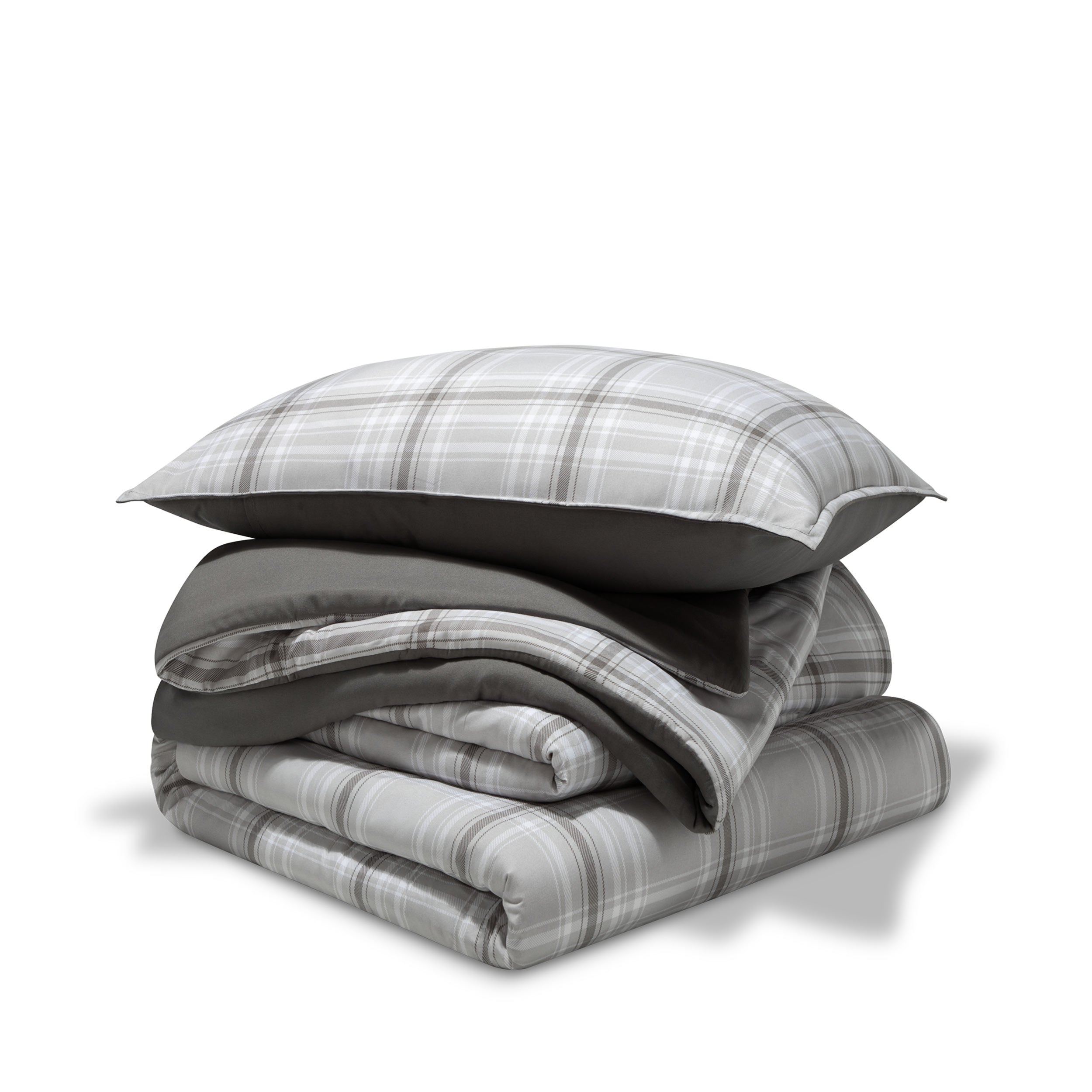 A printed comforter set folded and stacked