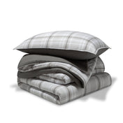 A comforter set folded and stacked