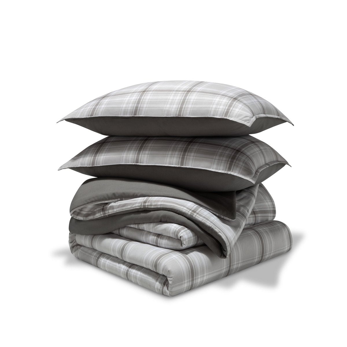 A comforter set folded and stacked