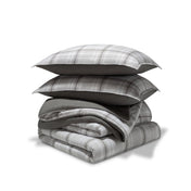 A comforter set folded and stacked