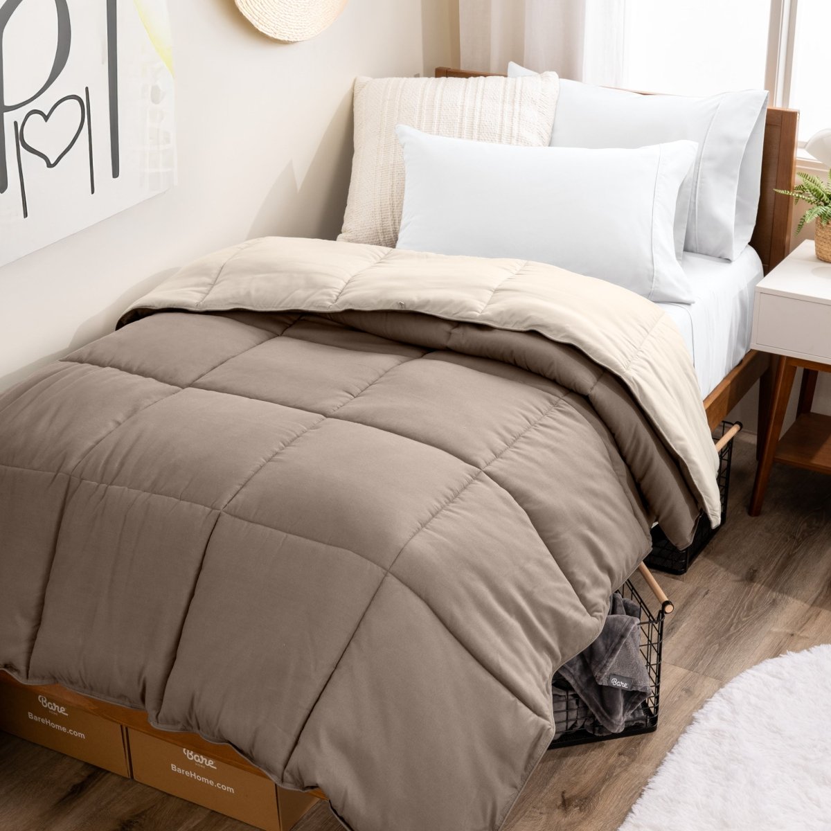 College dorm room with a reversible comforter on the bed