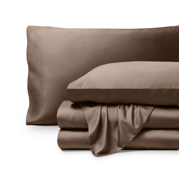 Bamboo pillowcases and sheets set on a white background