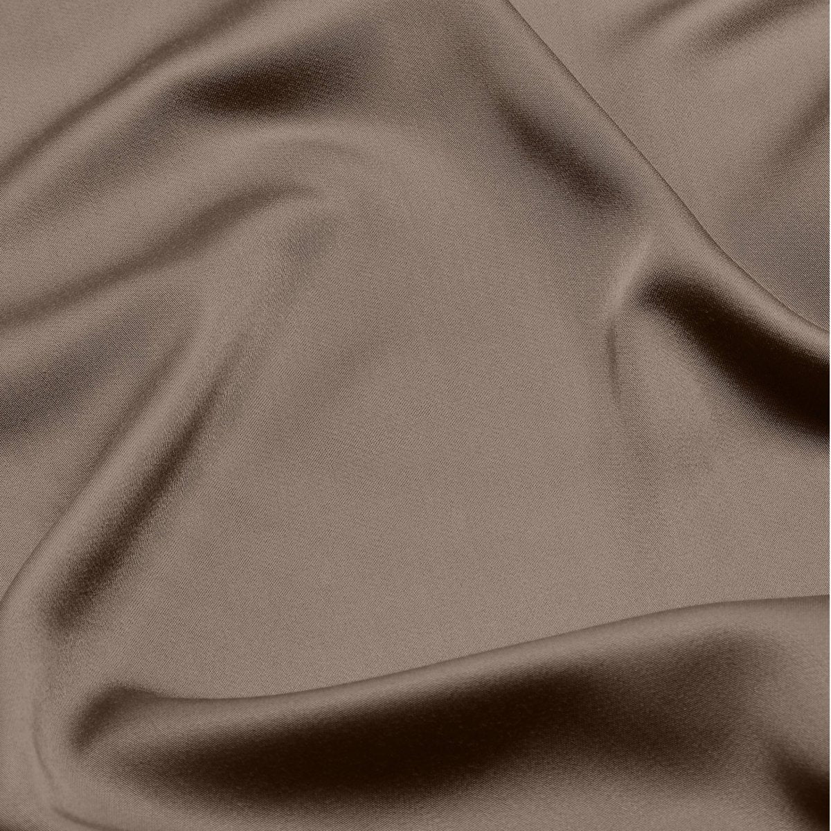 Close-up of taupe fabric with folds