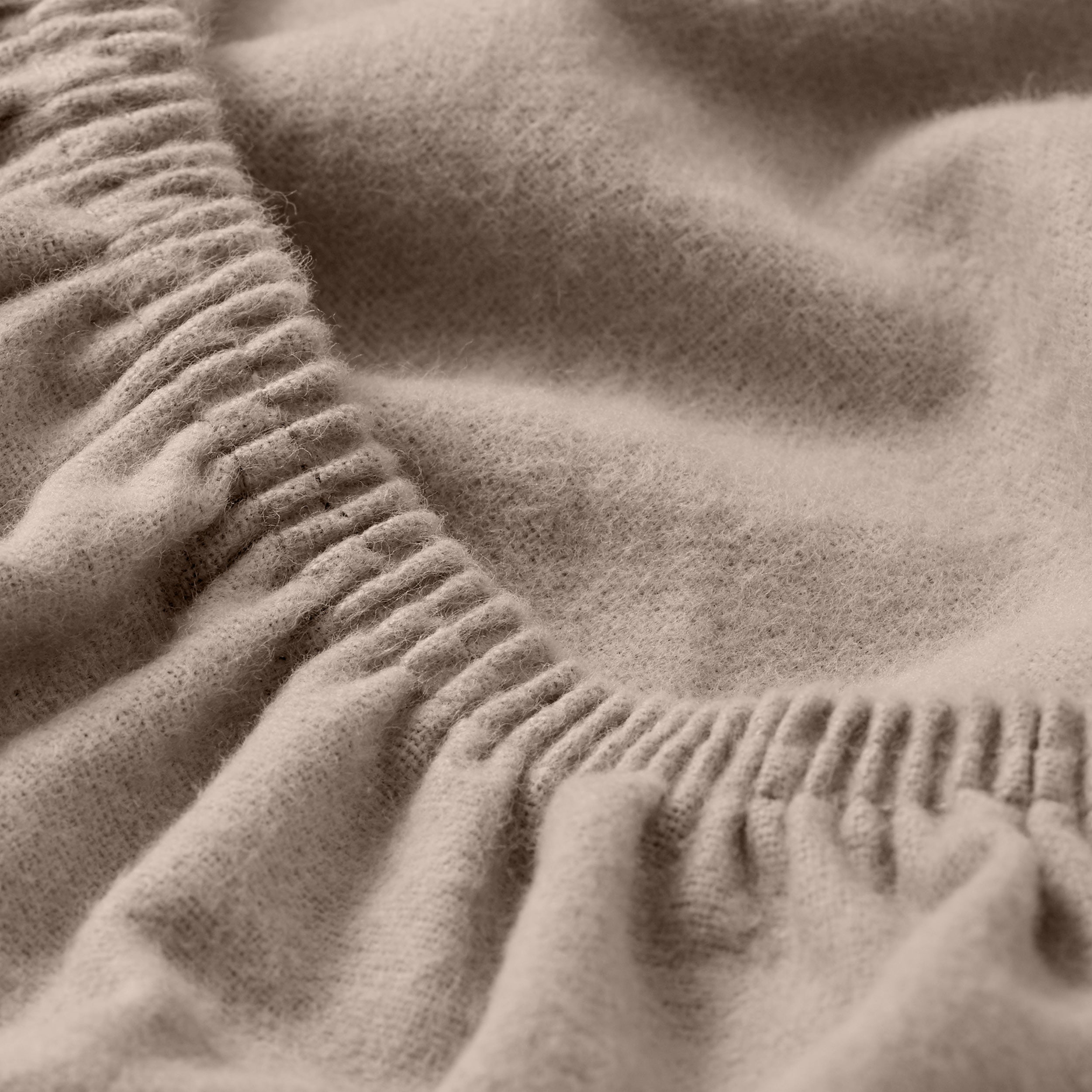 Close up of a flannel fitted sheet.