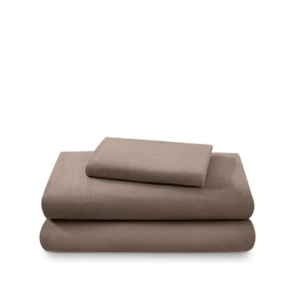 Cotton flannel sheet set folded and stacked on a white background
