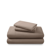 Cotton flannel sheet set folded and stacked on a white background