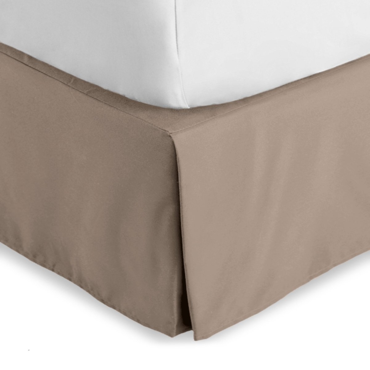 Bed skirt on a bed with white bedding