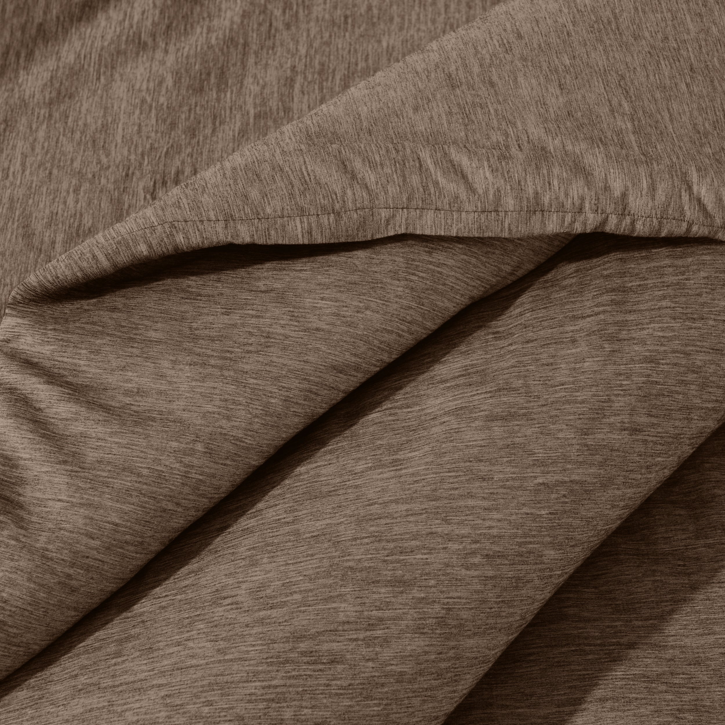 Close-up of comforter on a bed